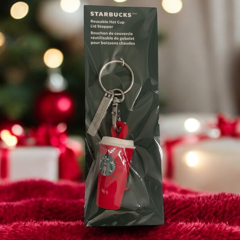 Starbucks Reusable Hot Cup Lid
Stopper Red Cup Keychain Winter 2025 Collection